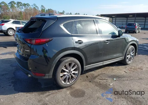 2021 Mazda Cx-5 Grand Touring z USA, uszkodzony, nr VIN JM3KFADM9M0350587